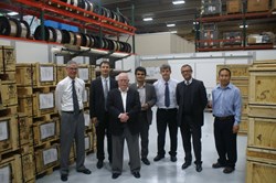 IO, F4E, USIPO and OST representatives standing in front of wooden crates containing the first deliveries of Nb3Sn strands ready to be shipped to Europe. (Click to view larger version...)