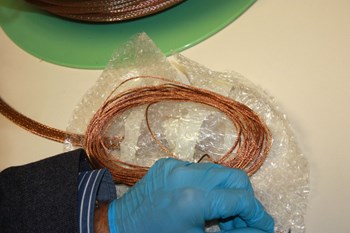 These small rope-like coils are tasked with a difficult job—measuring the total electric current flowing in the ITER plasma from their location inside of the toroidal field coils cases. (Click to view larger version...)