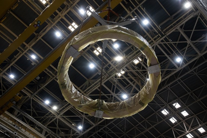 Pre-compression rings are part of the ITER magnet system. Made of glass fibre/epoxy composite, they will tightly hold the toroidal field coils at top and bottom with a radial force of 7,000 tonnes per coil. Two sets of three are required for operation. A spare set was inserted at the bottom of the assembly pit on Thursday 8 July. (Click to view larger version...)