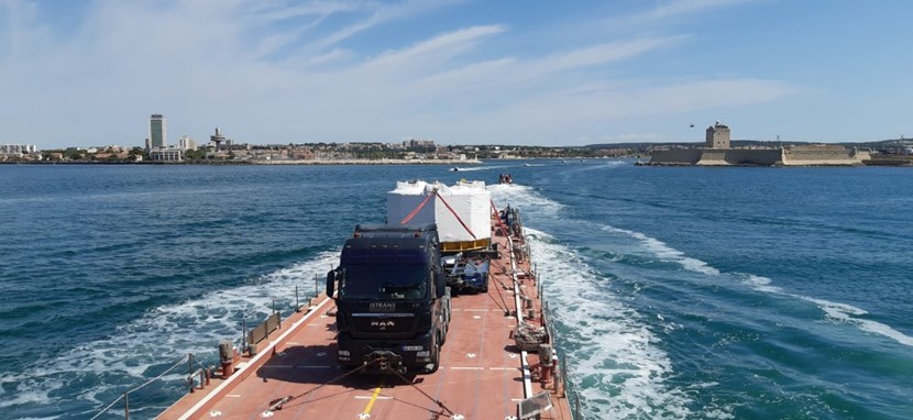 The first module of the ''most powerful magnet'' ever manufactured is seen here as it crosses the inland sea Étang-de-Berre. A second module is now crossing the Atlantic. (Click to view larger version...)