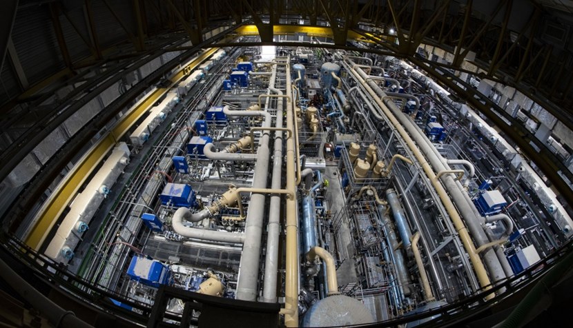 Over the past three and a half years, some 5,000 tonnes of equipment (tanks, compressors, piping, valves, truck-size electrical motors and Zeppelin-like gas bags) were installed in the cryoplant. Here, one of the three « trains » of helium screw compressors feeding the cold boxes with compressed helium at 20 bar. (Click to view larger version...)