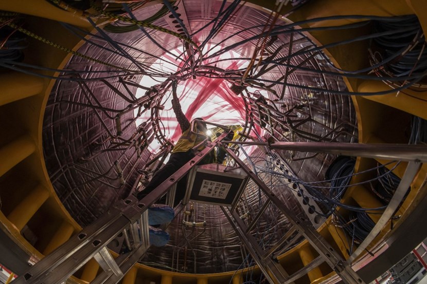 The first 110-tonne central solenoid module seen from below. US ITER is supplying seven modules (including one spare), the different elements of the central solenoid support (18 key blocks, 27 interior and exterior tie plates...), and the bespoke tools required for the assembly of the central solenoid magnet at ITER. (Click to view larger version...)