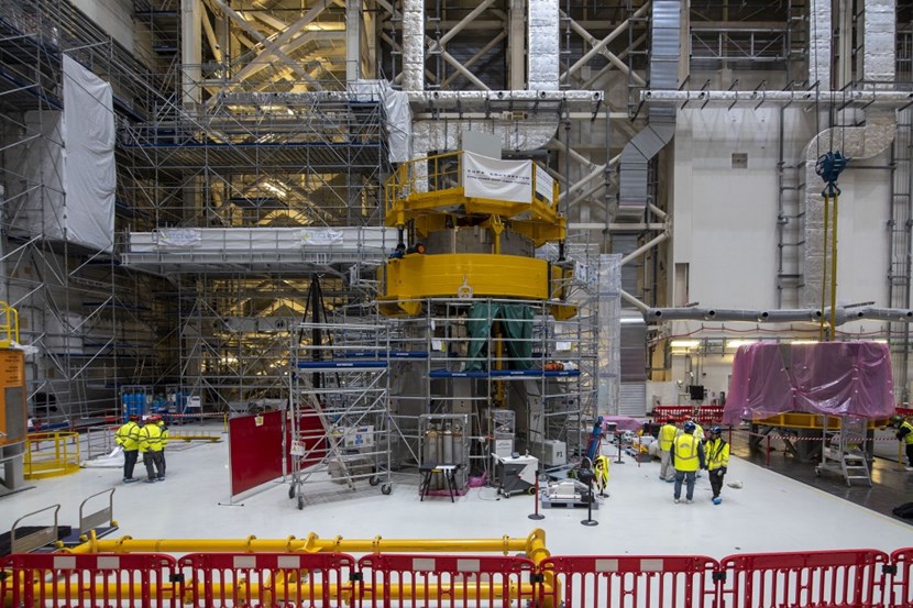 In one corner of the ITER Assembly Hall, work has started on the central solenoid magnet tower. The first module now sits atop nine lower key blocks on a dedicated assembly platform. Five more modules will bring the tower to well over 20 metres (platform included), rivalling the height of a seven-storey residential building. (Click to view larger version...)