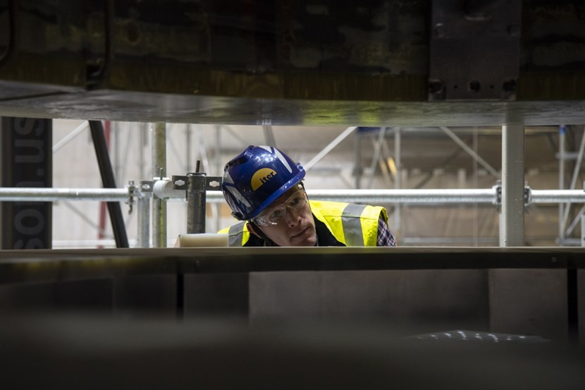 American Carl Cormany from ITER's Magnet Section works closely with the contractor team as it carries out the many assembly steps required on module one, including alignment, electrical connections, welding, and inspection and testing. (Click to view larger version...)