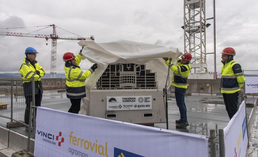 Presented by the VFR consortium to Fusion for Energy, the steel cutaway of the Tokamak Complex, mounted on a 1,650-tonne reinforced concrete base, symbolically marked the completion of the main construction works on the Tritium Building. (Click to view larger version...)