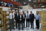 IO, F4E, USIPO and OST representatives standing in front of wooden crates containing the first deliveries of Nb3Sn strands ready to be shipped to Europe.